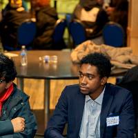 International Anchor Allies Winter 2026 First Mixer - crew members listening